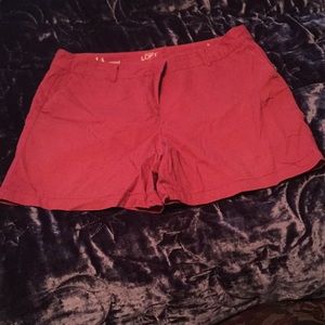 Fuchsia mid thigh shorts.